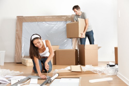 Van moving boxes outside a Crooklog property