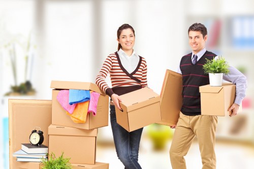 Loading furniture into a moving truck for a Crooklog move