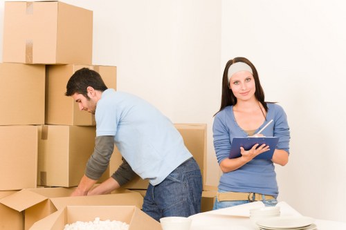 Packed boxes and furniture ready for a Crooklog house relocation