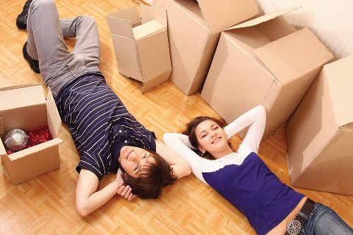 Team managing a booked move with careful loading at the property