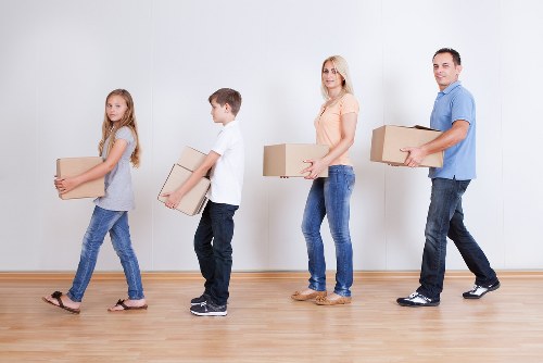 Packed boxes and furniture ready for a free quote
