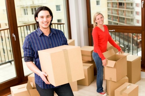 Local moving team loading furniture in Crooklog